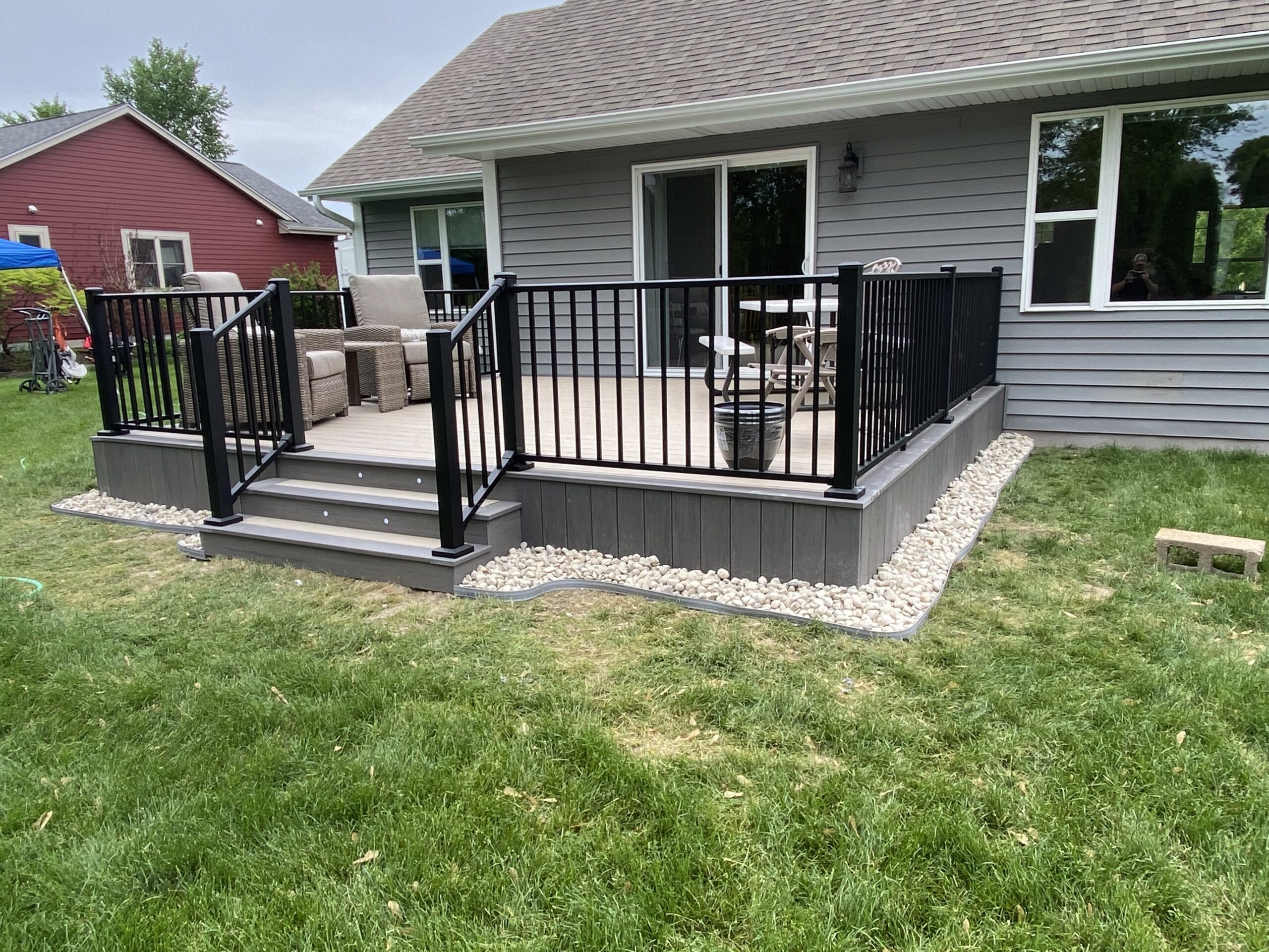 Photo of Rectangular Deck with Black Metal Rails - Custom Composite Deck builder and contractor Washington County, WI