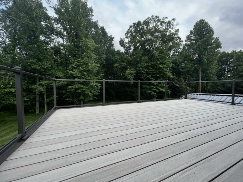 Photo of Gray Composite Deck with Black Railing