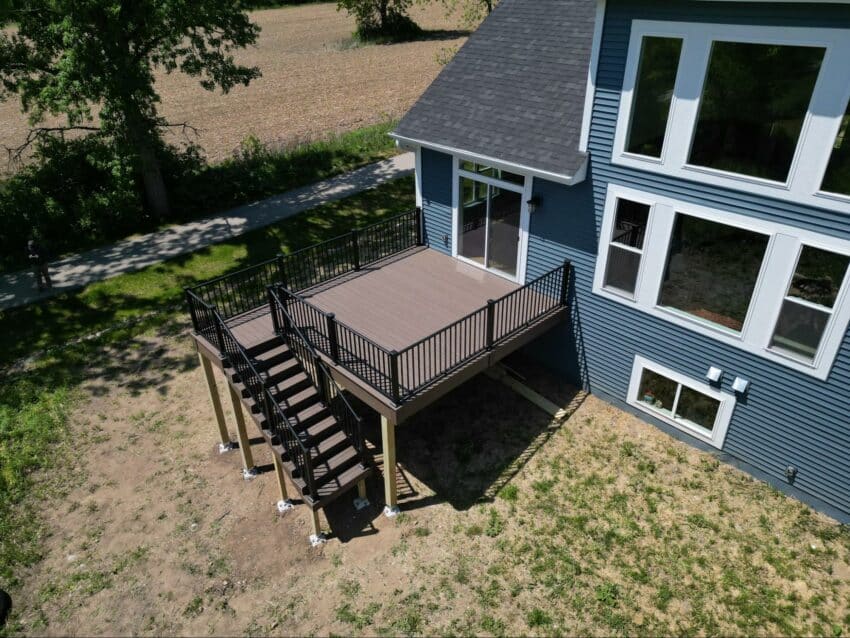 Photo of Elevated Deck with Black Railing and Steps