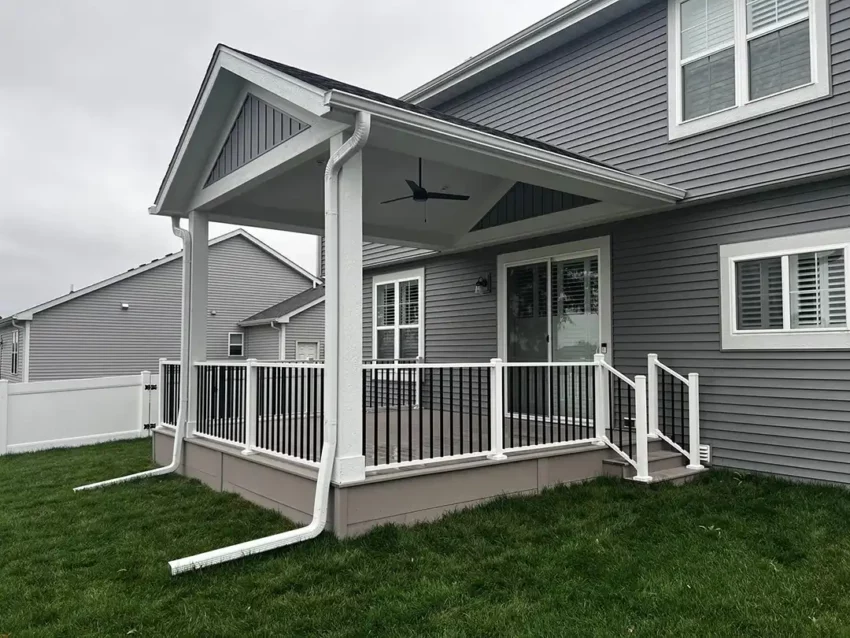 Photo of a covered deck attached to a home with an angular cover.