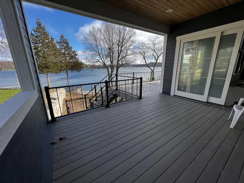 Photo of a covered deck overlooking a lake