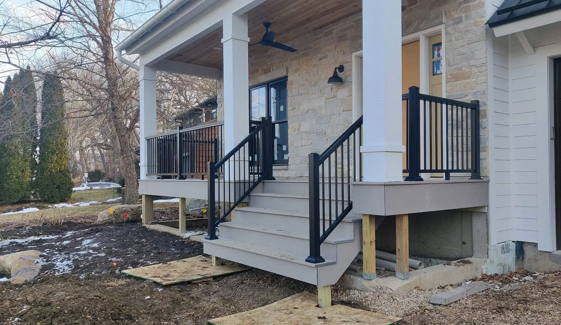 photo of a front porch under construction - Difference between deck and porches - Poch builders