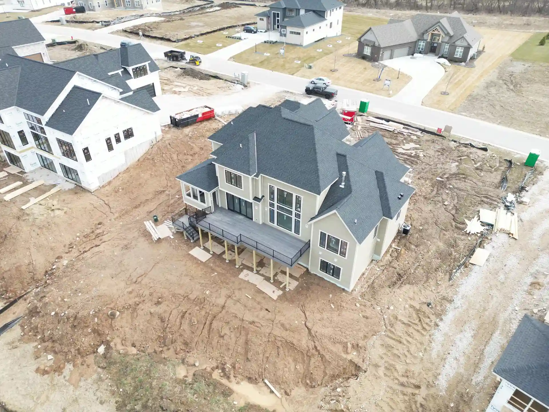 aerial photo of a deck being built on a new home - building a deck in winter - Custom Deck Builders in Washington County Wisconsin