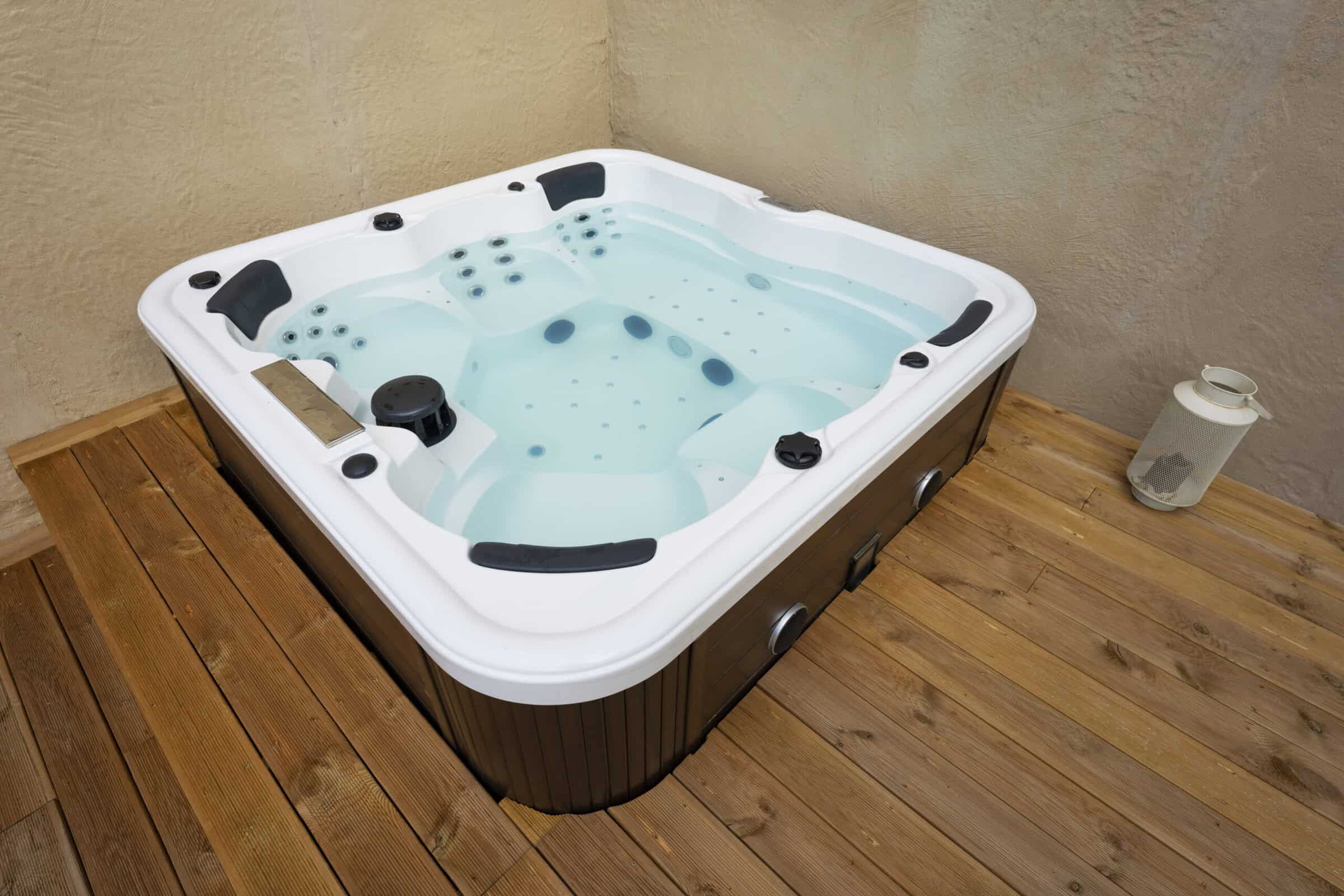 jacuzzi on wooden floor in a house
