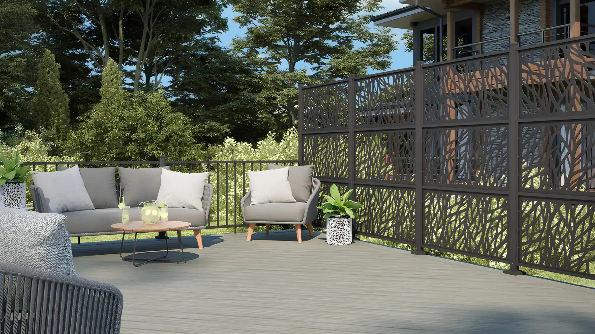 Venture saltwater wildwood privacy screen on the deck with outdoor living furniture featuring trees on the background in slinger wi