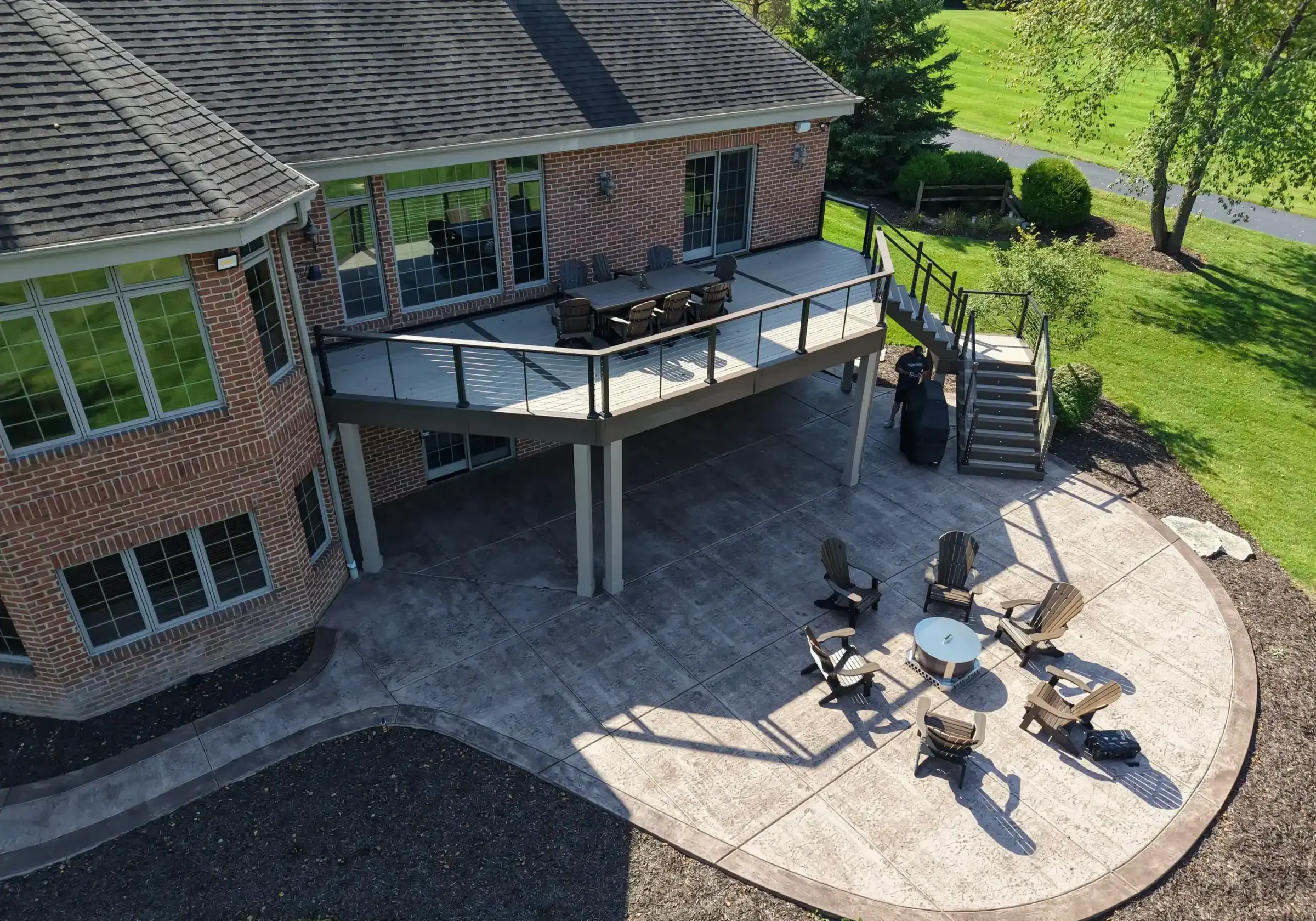 attached patio with a firepit with outdoor chairs